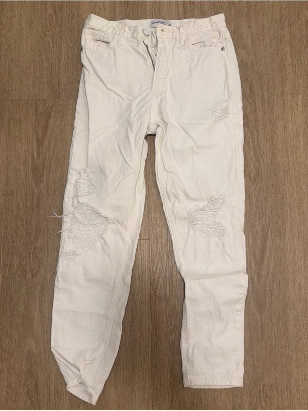 Women’s Distressed White Jeans